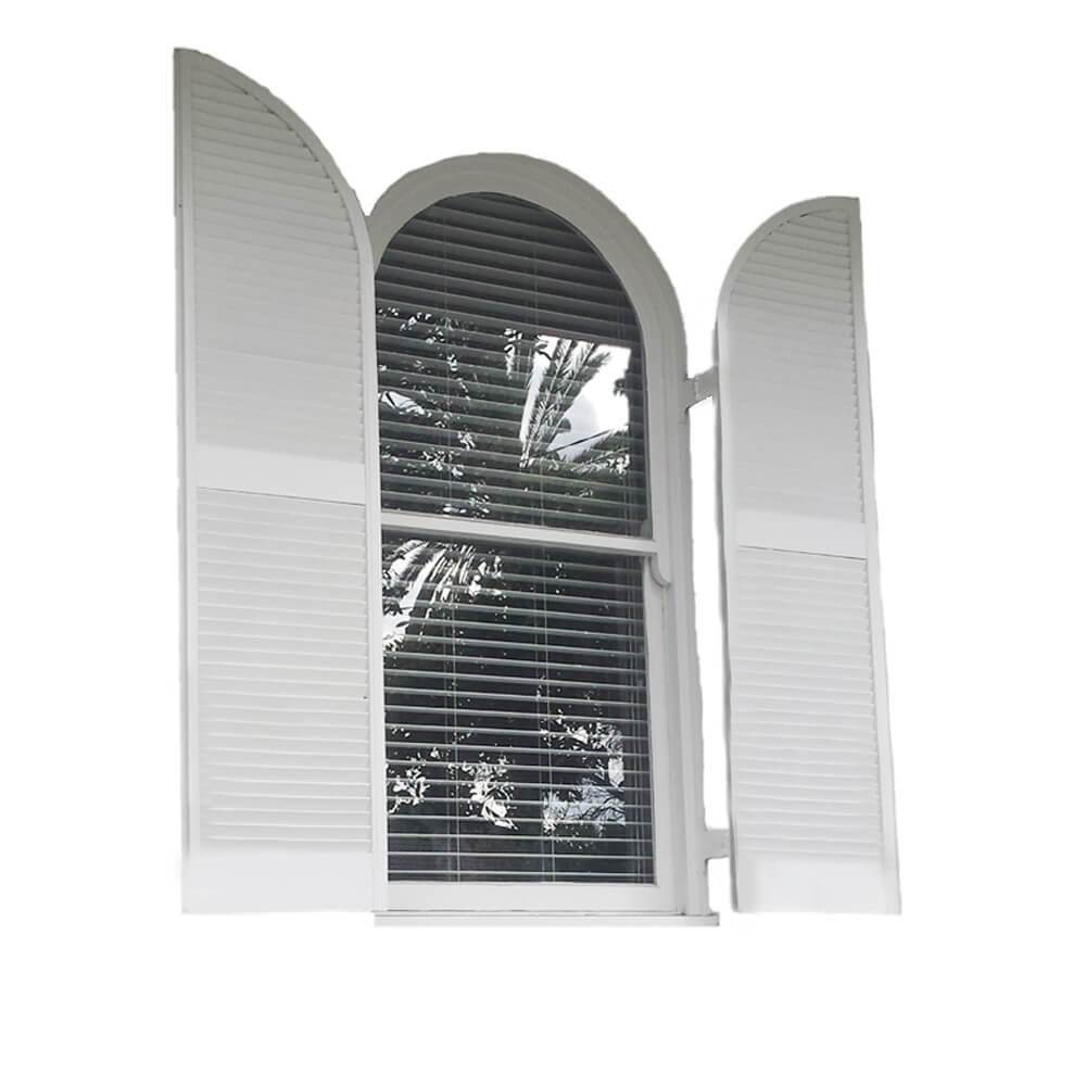 White arched timber shutters beside an arched window